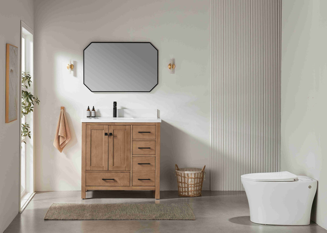 Bathroom with wooden vanity, mirror, and toilet.