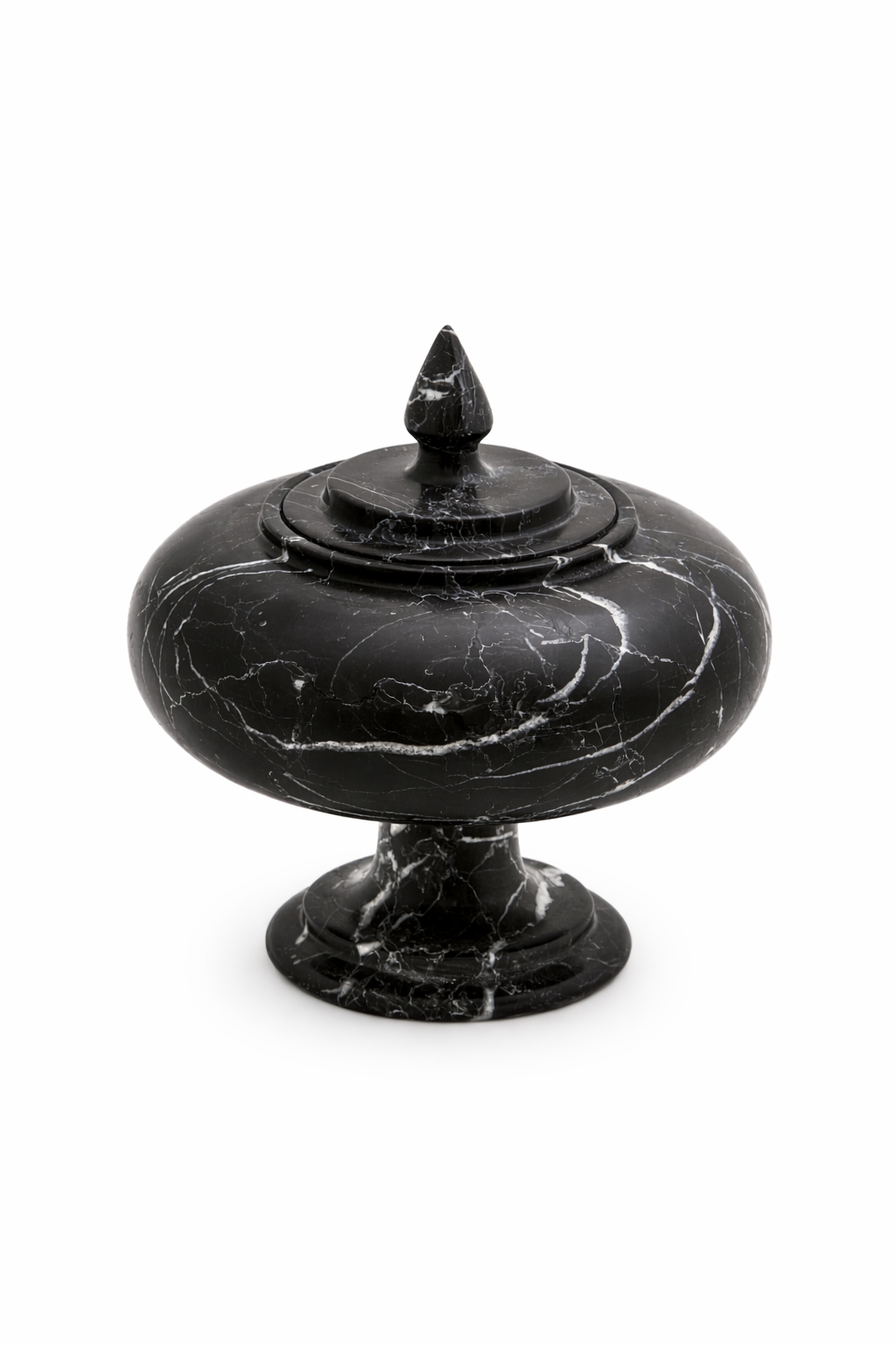 Black marble decorative object with a lid on a white background