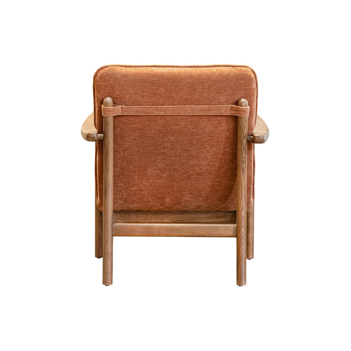 Brown armchair with wooden frame on a white background