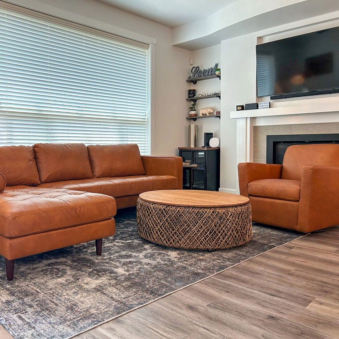 Cayo reclaimed teak woven coffee table styled in bohemian Canadian living room