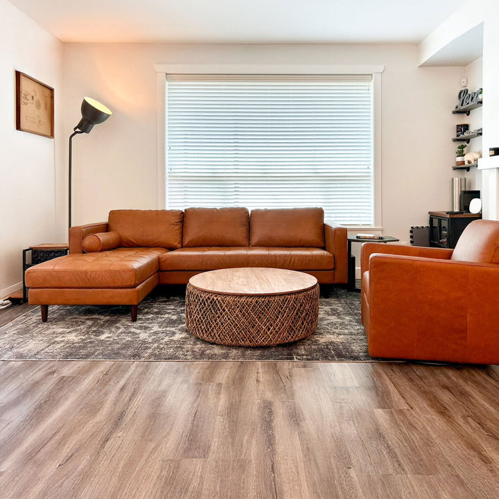 Cayo reclaimed teak woven coffee table styled in bohemian Canadian living room
