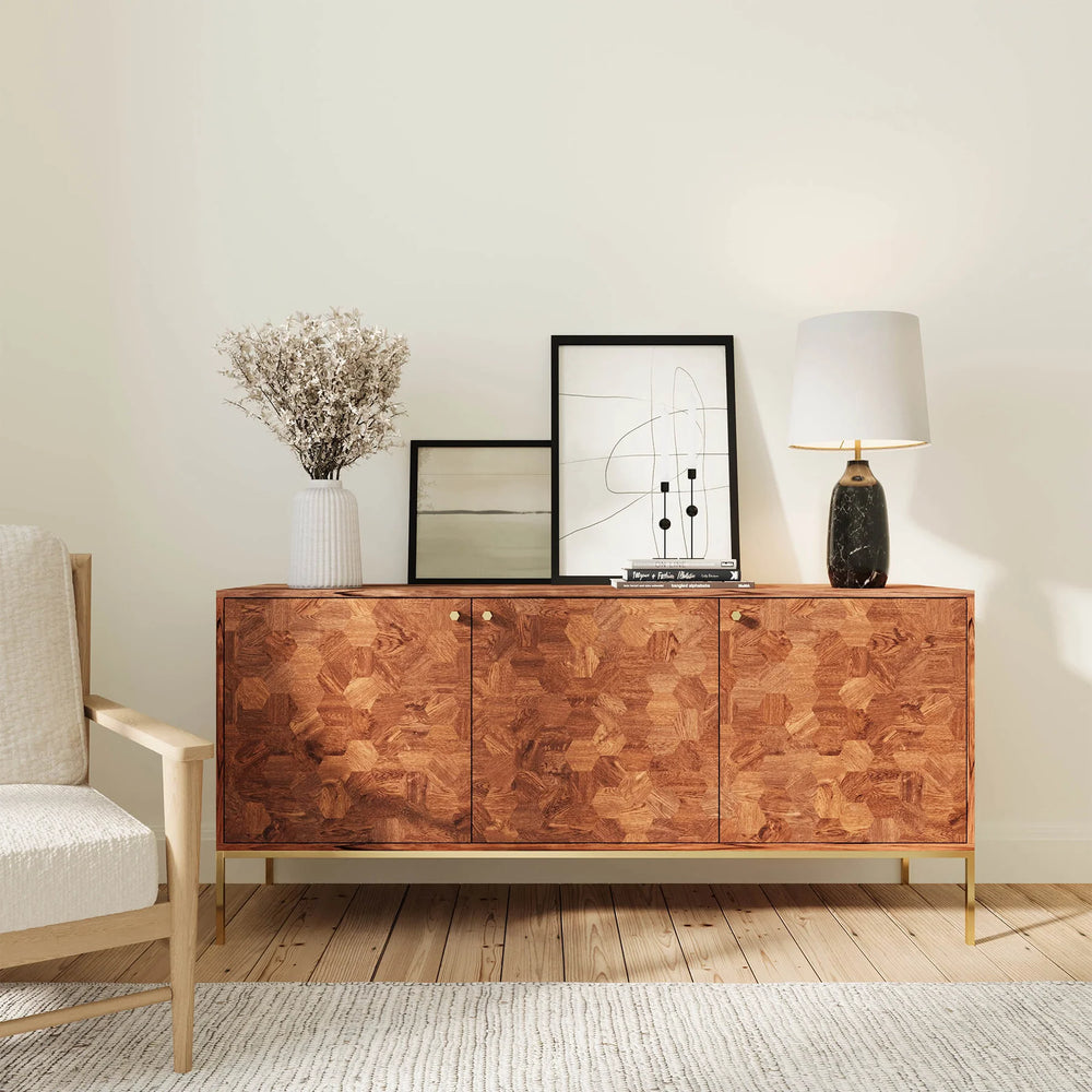 Dining room featuring Hexa sideboard styled with warm décor accents