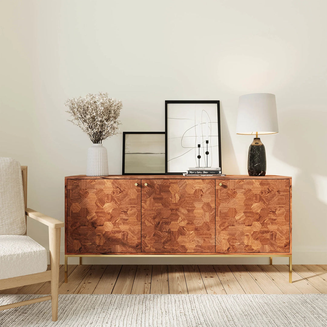 Dining room featuring Hexa sideboard styled with warm décor accents